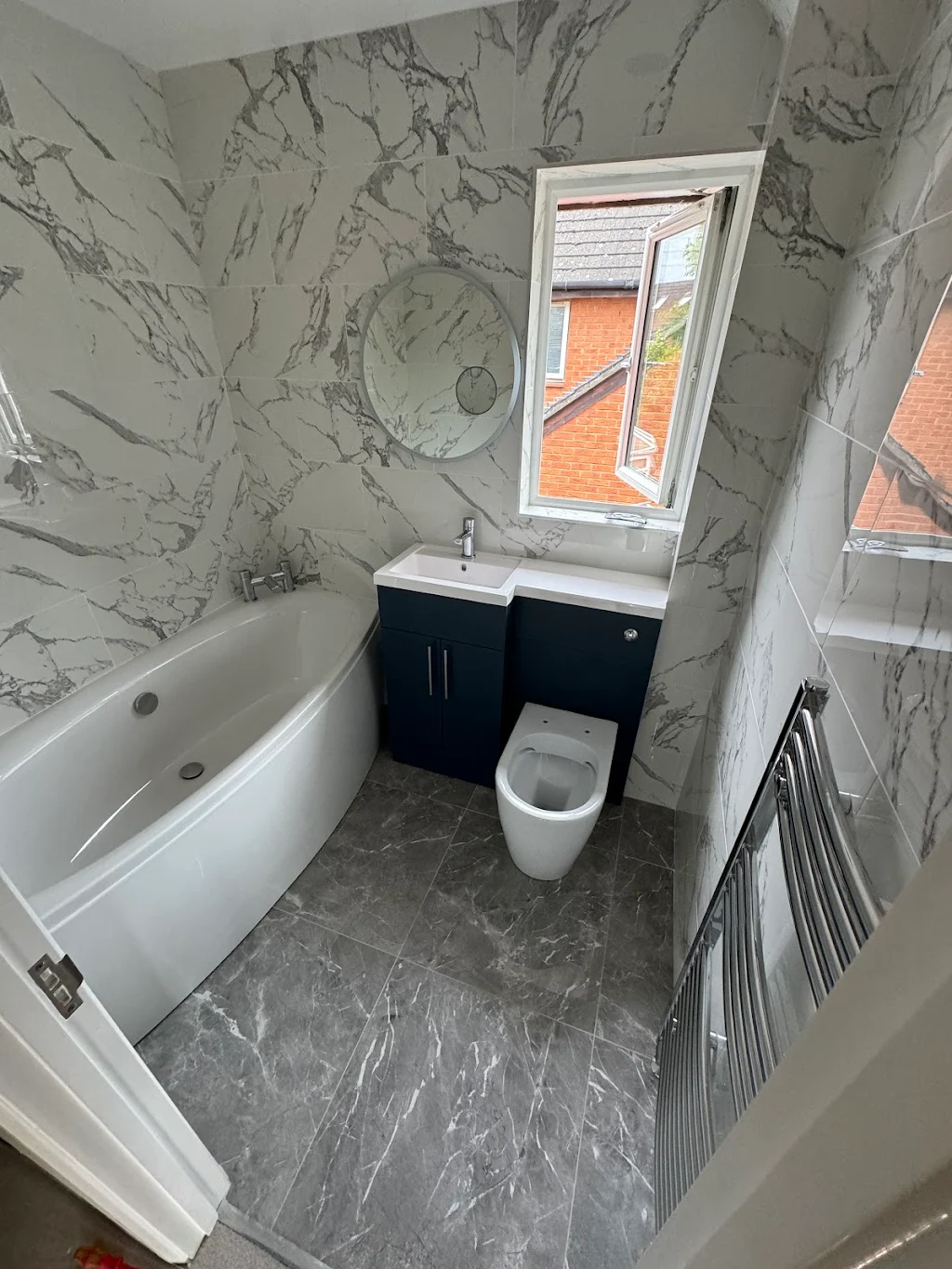 Luxury marble tiled bathroom